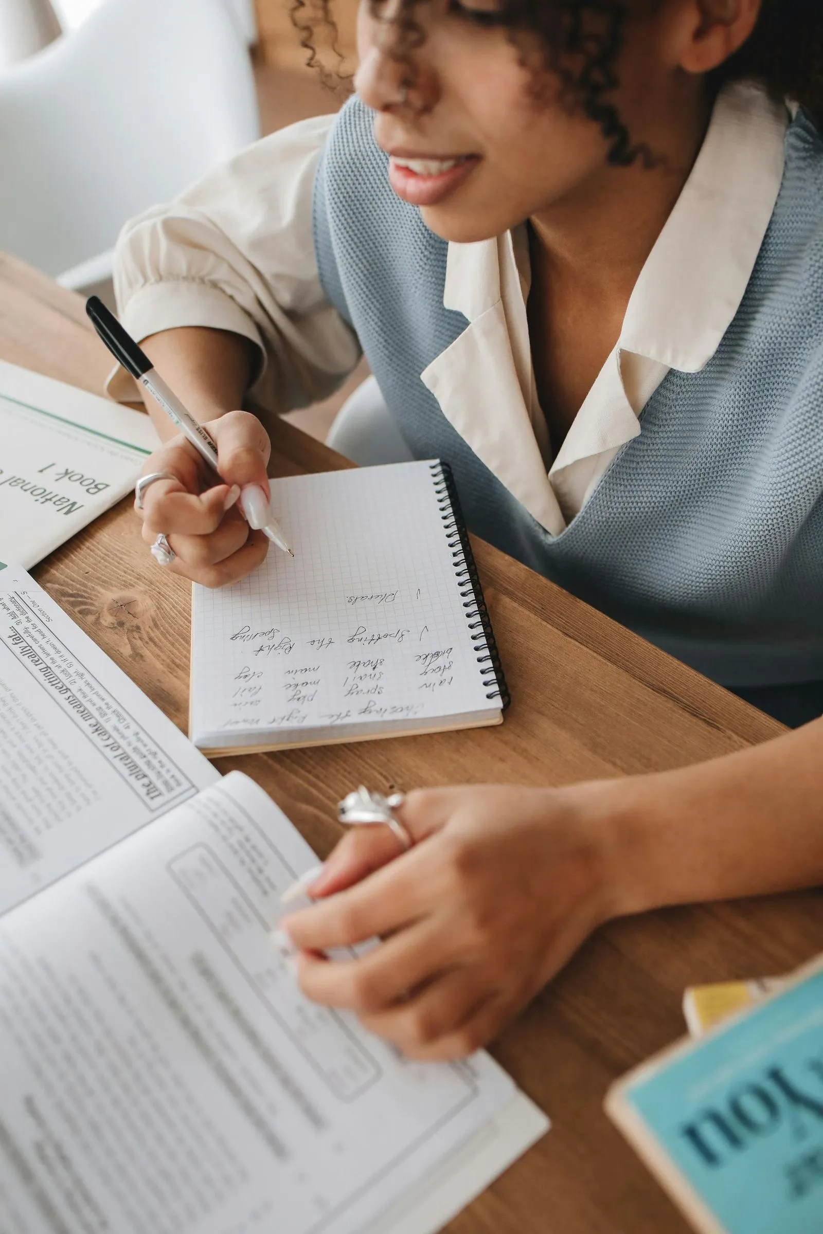 A teacher reviewing generated materials on their tablet